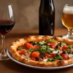 Vino e pizza gourmet: il pairing fondamentale per risultati che vanno oltre la birra classica
